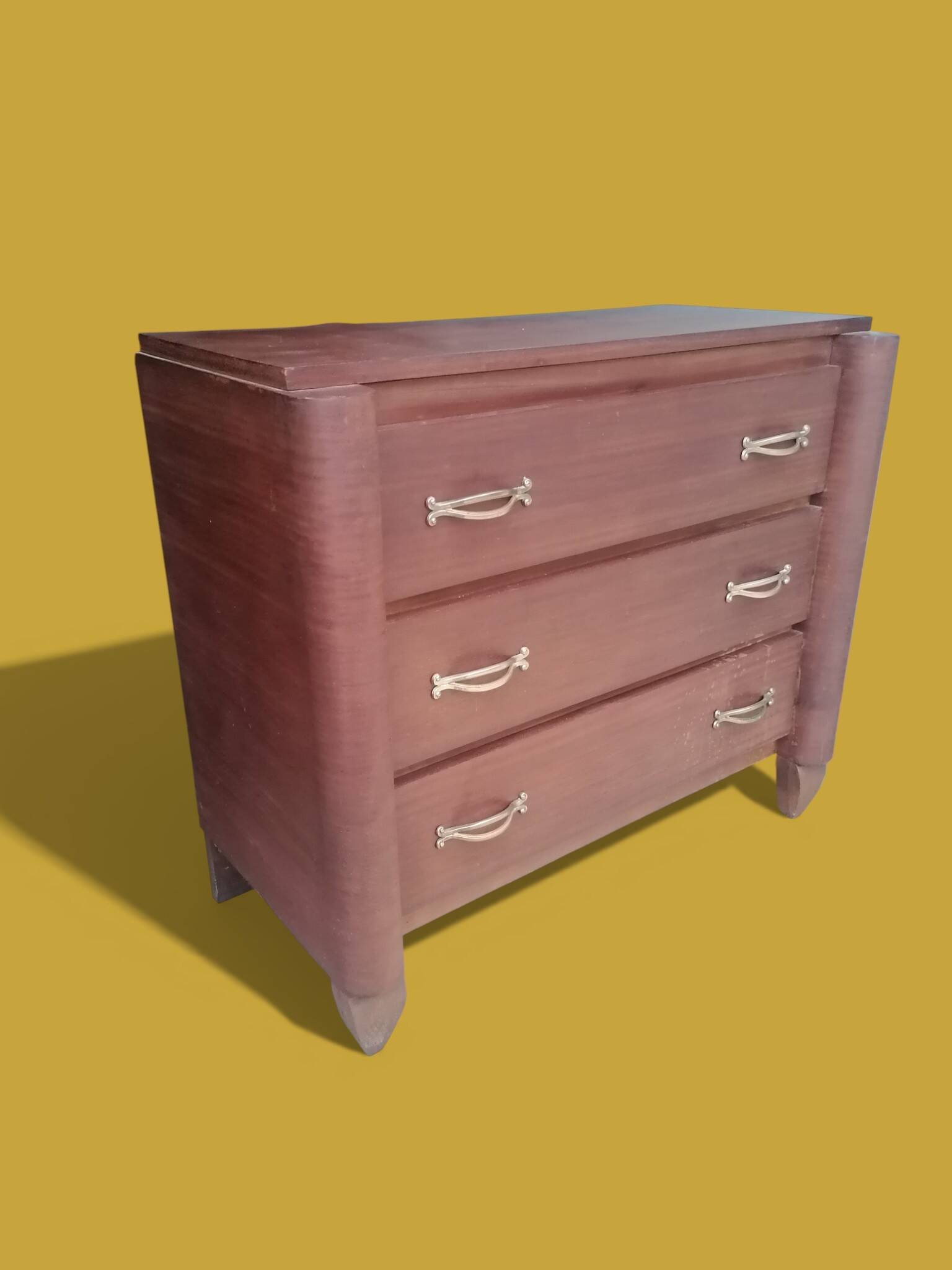 Small wooden veneer Art Deco chest of drawers.