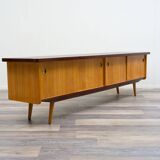 1950s low sideboard in ash, black formica surface. Professionally restored