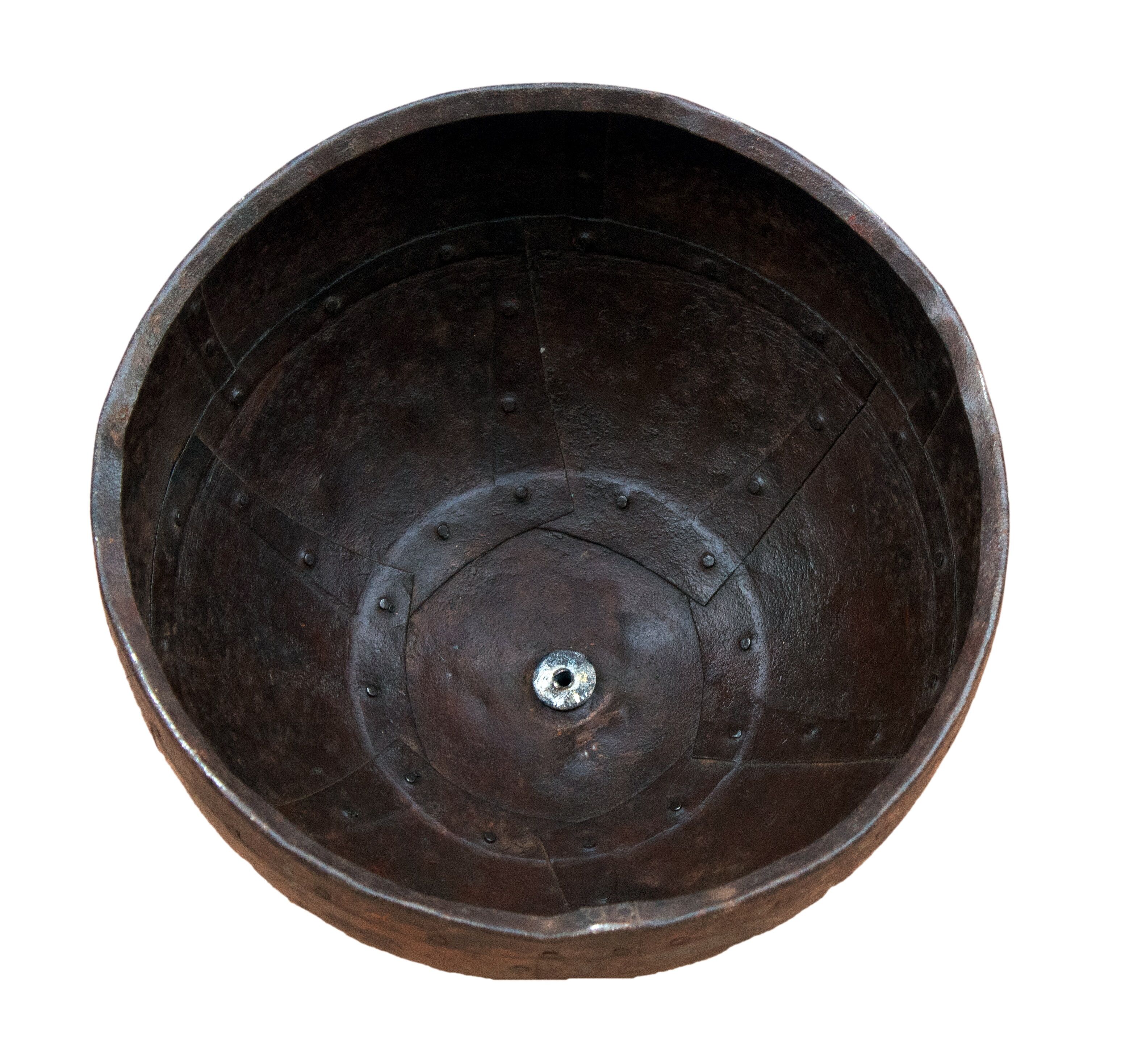 Metal hanging with its original rust colour