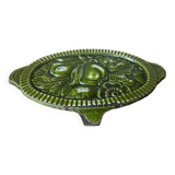 Old enameled cast iron trivet