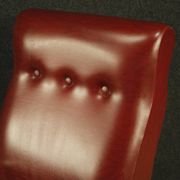 Italian design armchair in red faux leather from the 70s