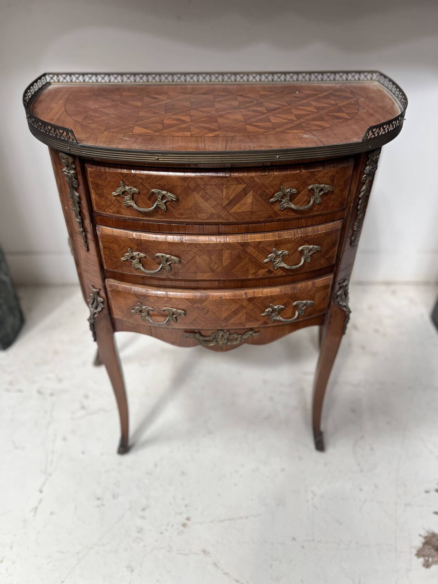 Half-moon commode in Louis XV style with cube marquetry from the 20th century.
