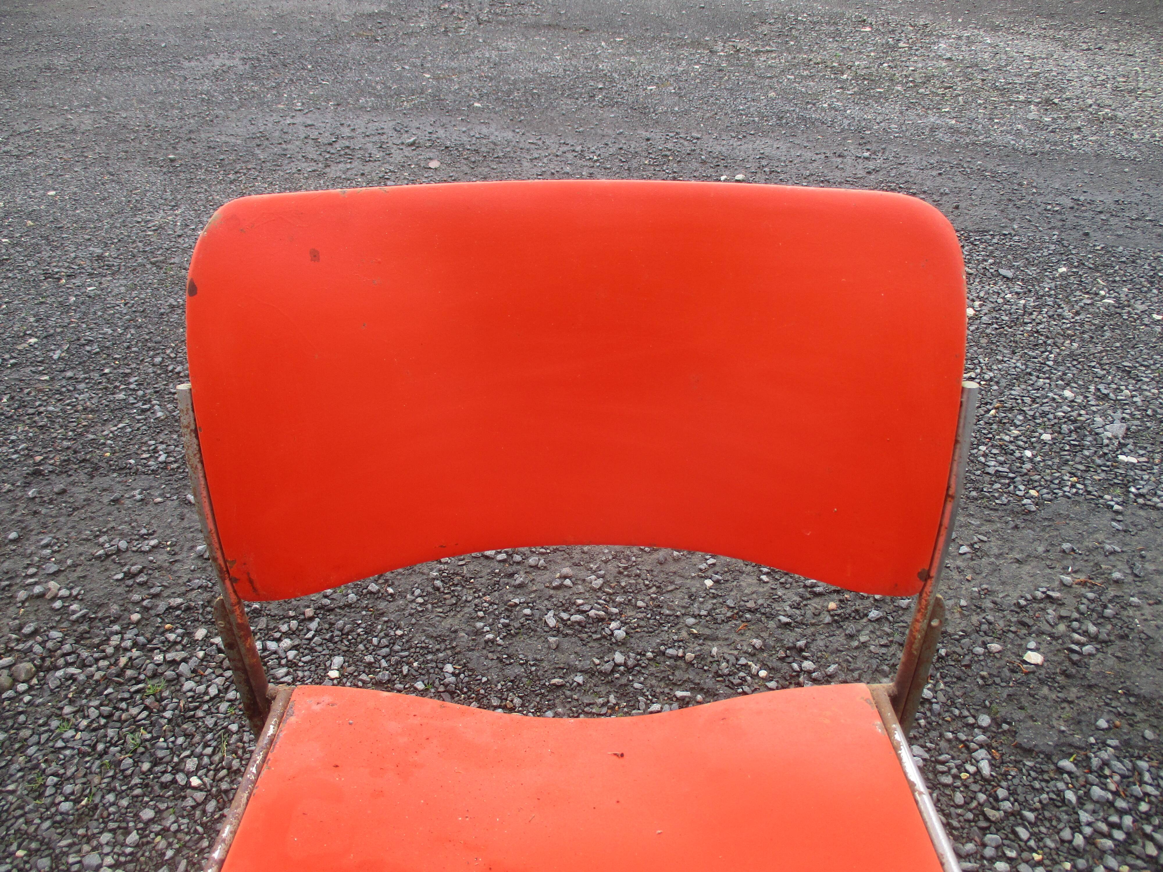 3 iron and plastic chairs