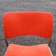 3 iron and plastic chairs
