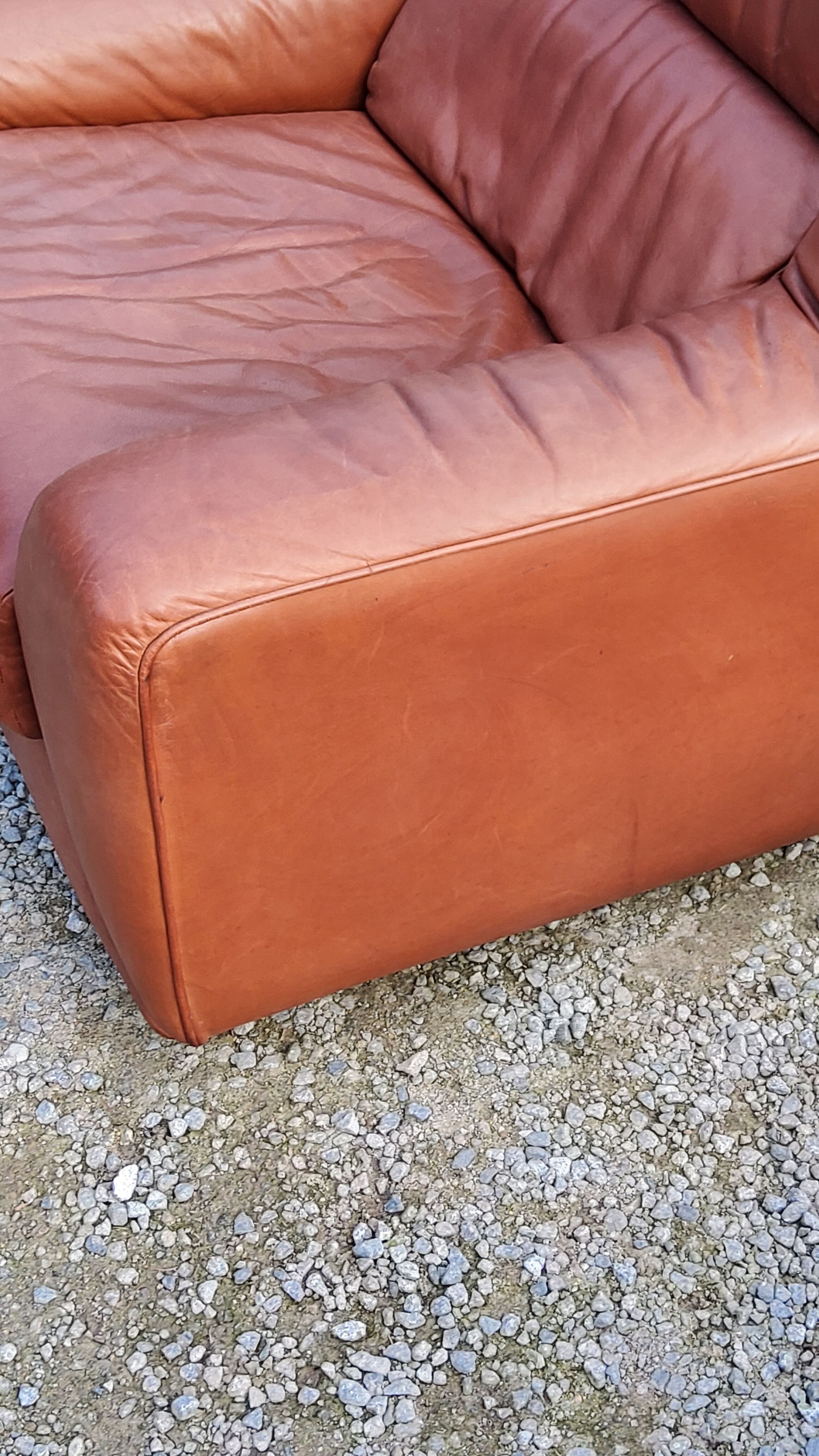 Pair of armchairs and De Sede sofa in cognac leather from the 70s/80s