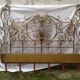 Golden wrought iron bedhead