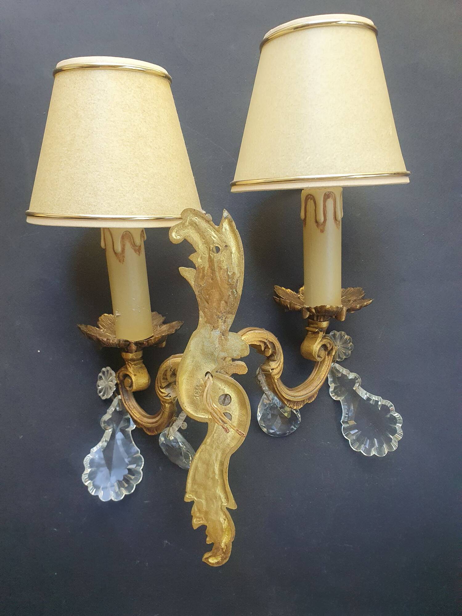 Pair of wall sconces candle holders with antique pendants
