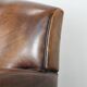 Characterful set of two vintage sheepskin armchairs with beautiful colours