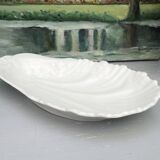 Scallop-shaped pocket emptier