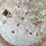 Round vintage wall lamp in transparent molded glass