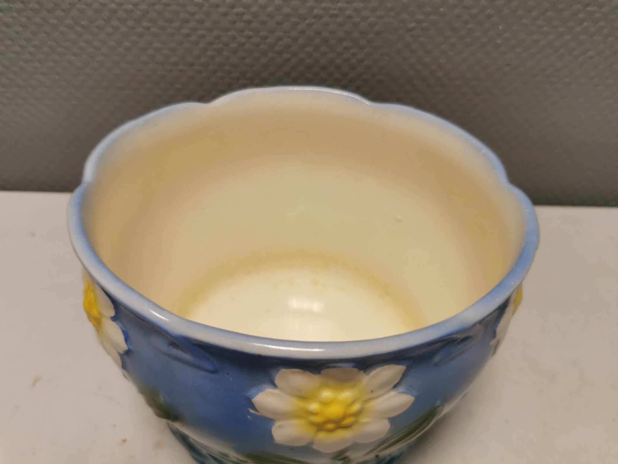 Very beautiful flower pot in soft blue and white color with floral motifs.