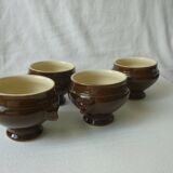mini earthenware soup tureens in brown and beige inside.