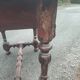 Small antique writing table in Louis XIII style made of oak.