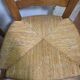 4 rustic farmhouse chairs made of wood and straw
