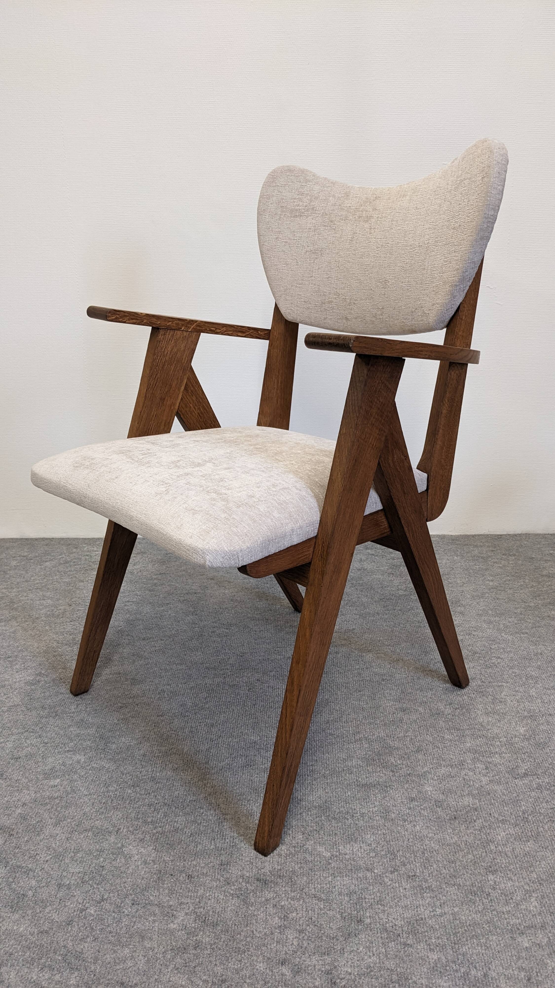 Pair of Scandinavian bridge armchairs in teak, Denmark circa 1950.