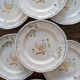 7 hand-painted earthenware dessert plates – France, 1950s