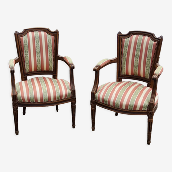 Pair of Louis XVI style convertible armchairs