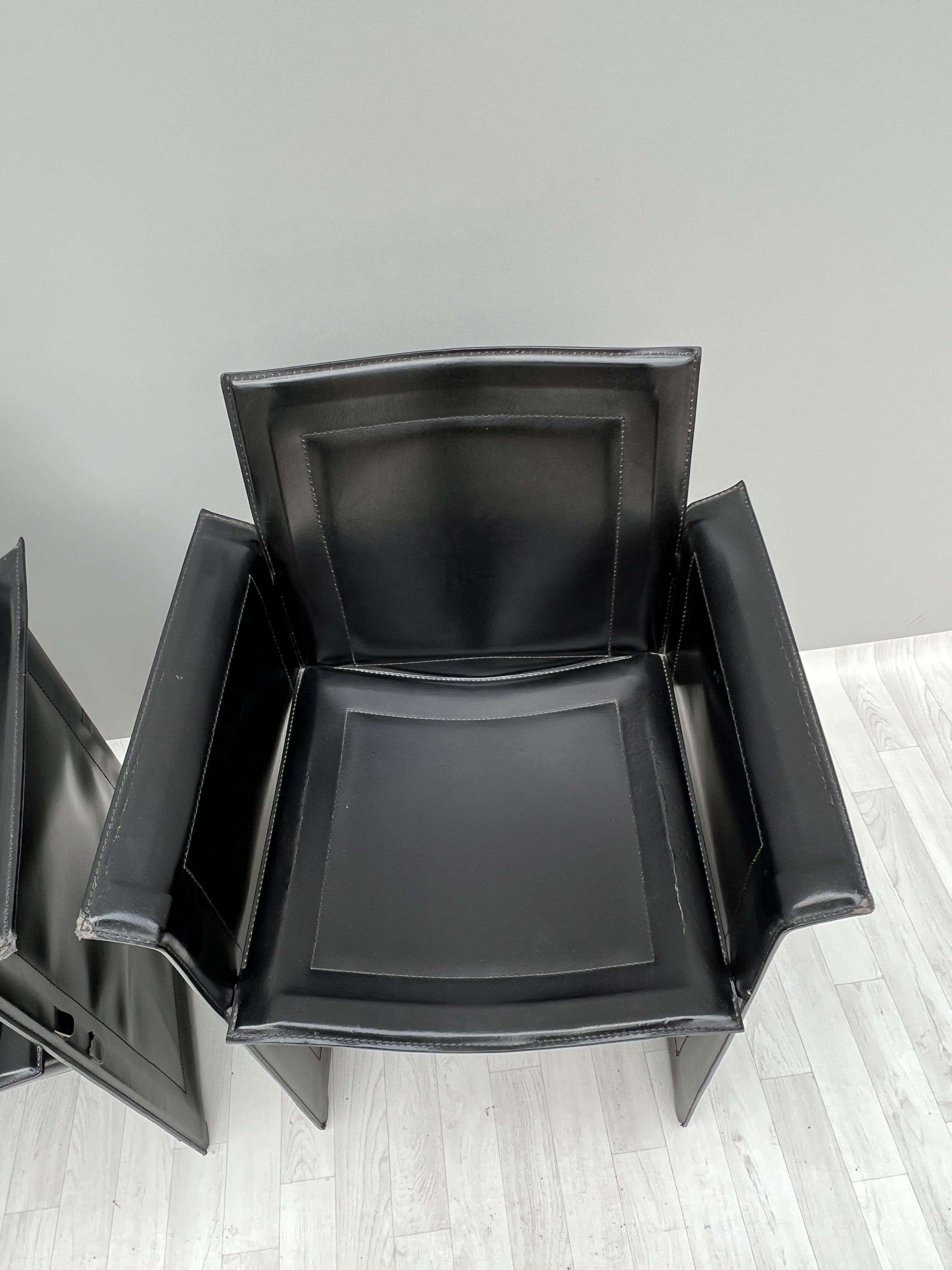 Pair of armchairs in black leather