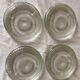 Under vintage bottles or carafes