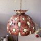 Suspension in mother-of-pearl shell and bohemian brass