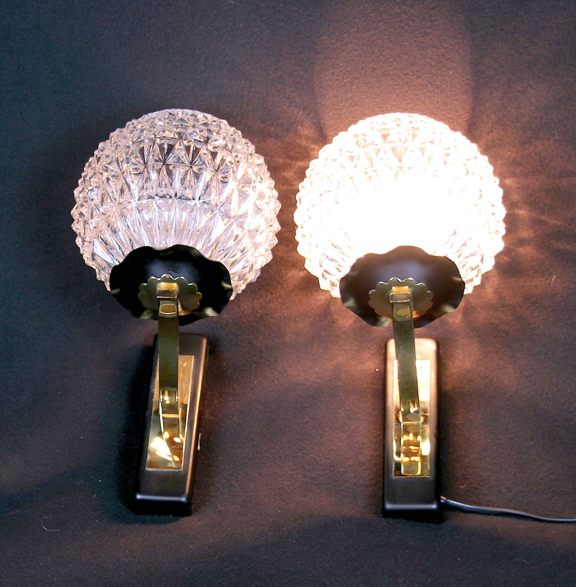 Maison Arlus Pair of brass and black wall sconces, France Mid-Century