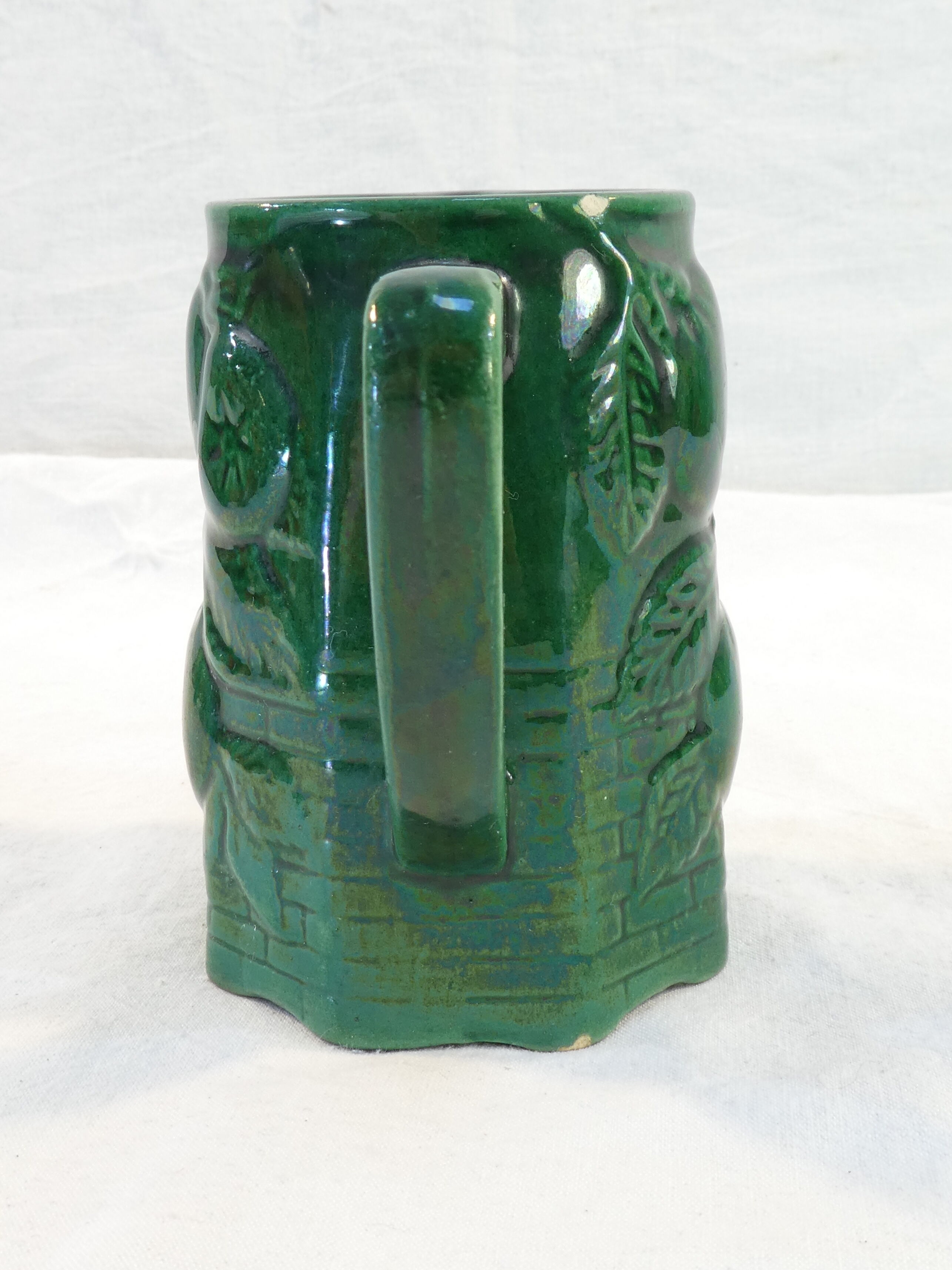 Pitcher vintage green slurry in faience of st clement with fruit