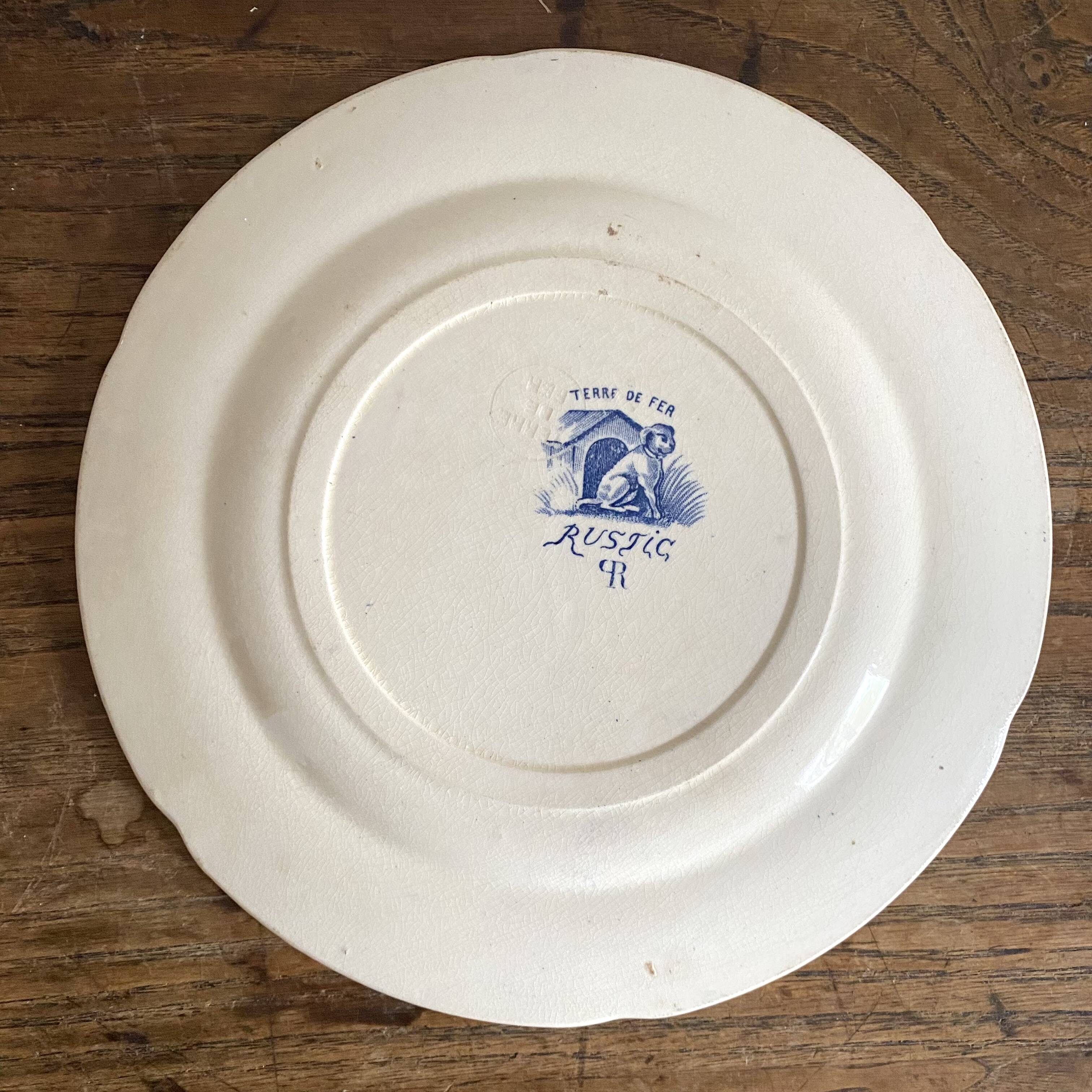 "Rustic" iron earth plate with goats