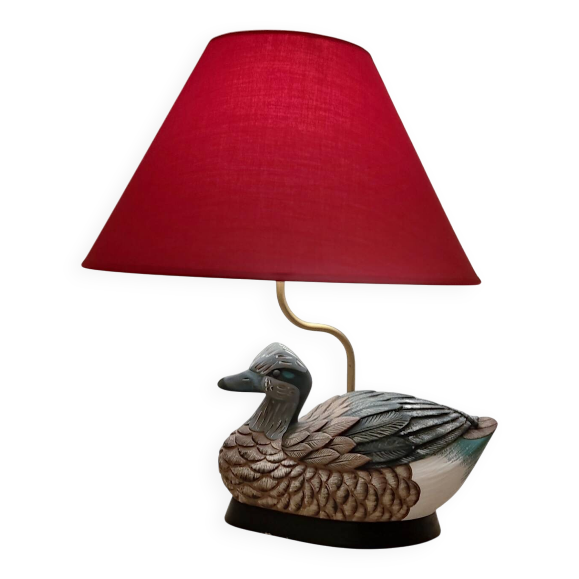 Decorative table lamp with a sculpted duck-shaped base and painted finish.