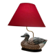Decorative table lamp with a sculpted duck-shaped base and painted finish.