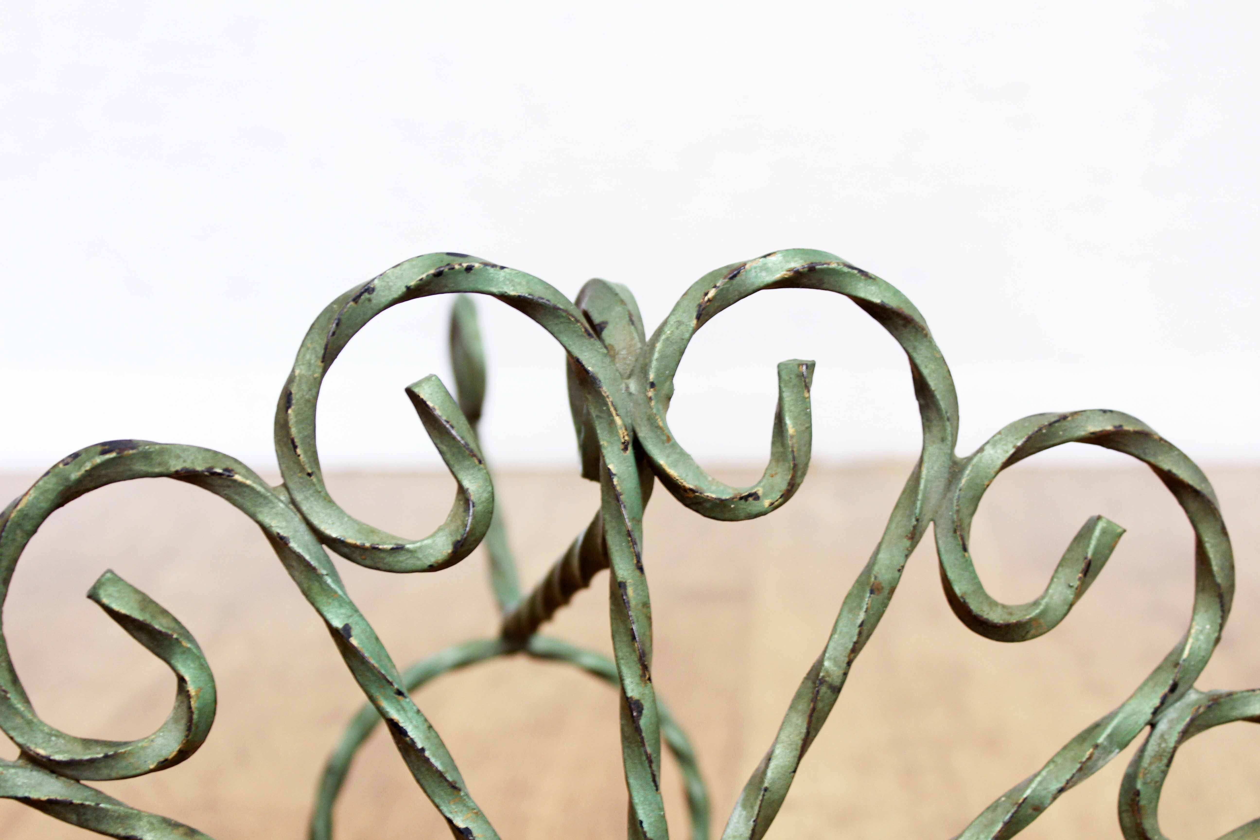 Wrought iron plant holder