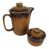Coffee pot and sugar bowl in glazed stoneware, deep brown glazes.