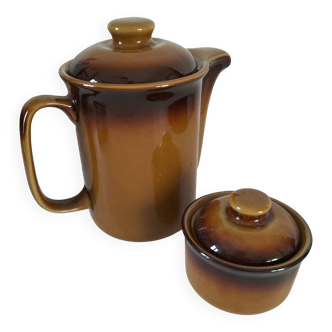 Coffee pot and sugar bowl in glazed stoneware, deep brown glazes.