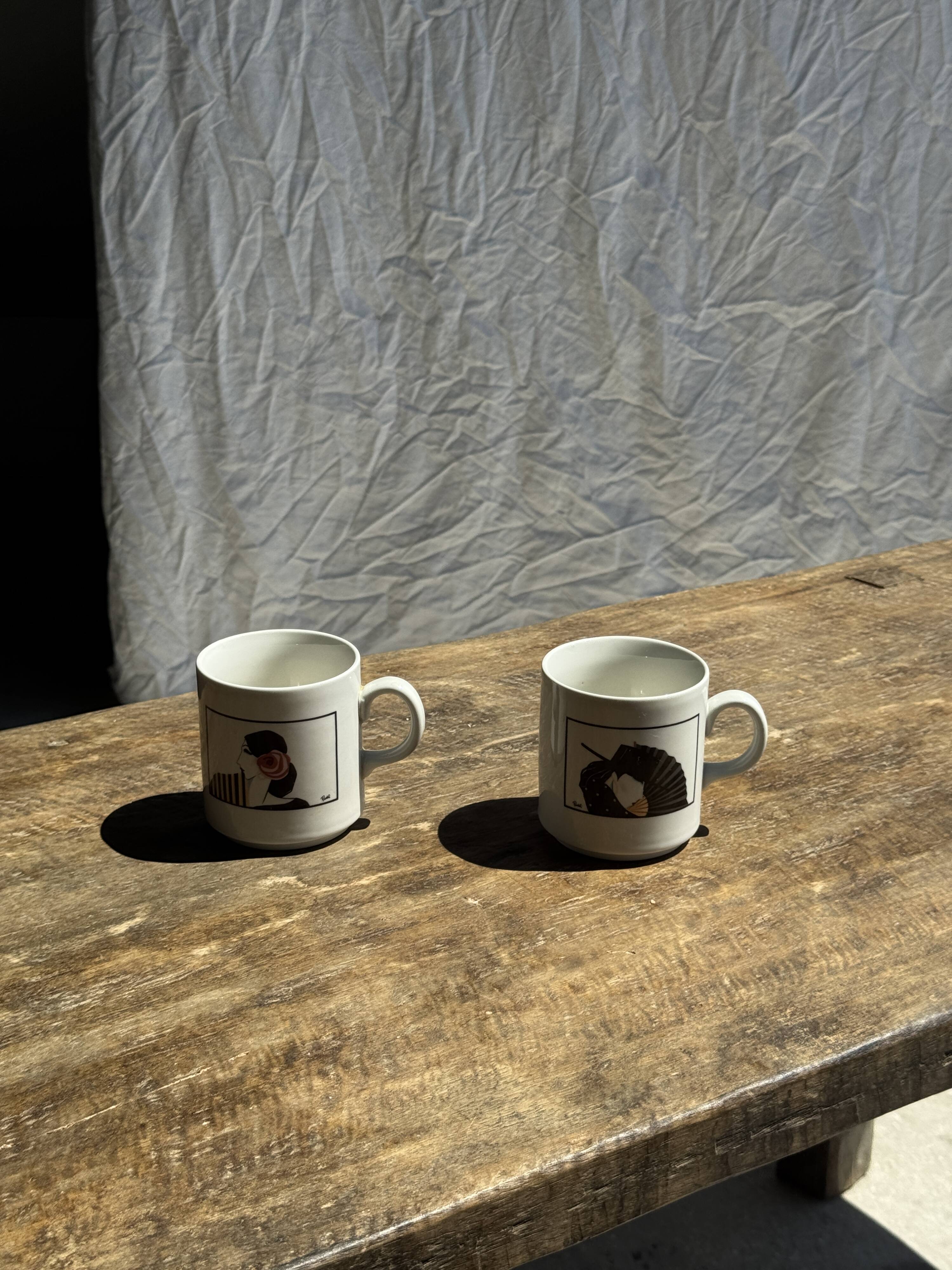 Pair of mugs with stylized Italian women motifs