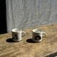 Pair of mugs with stylized Italian women motifs