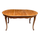 Round extendable dining table Louis XV in solid wood from the 1960s.