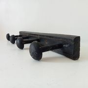 Old wooden wall coat rack