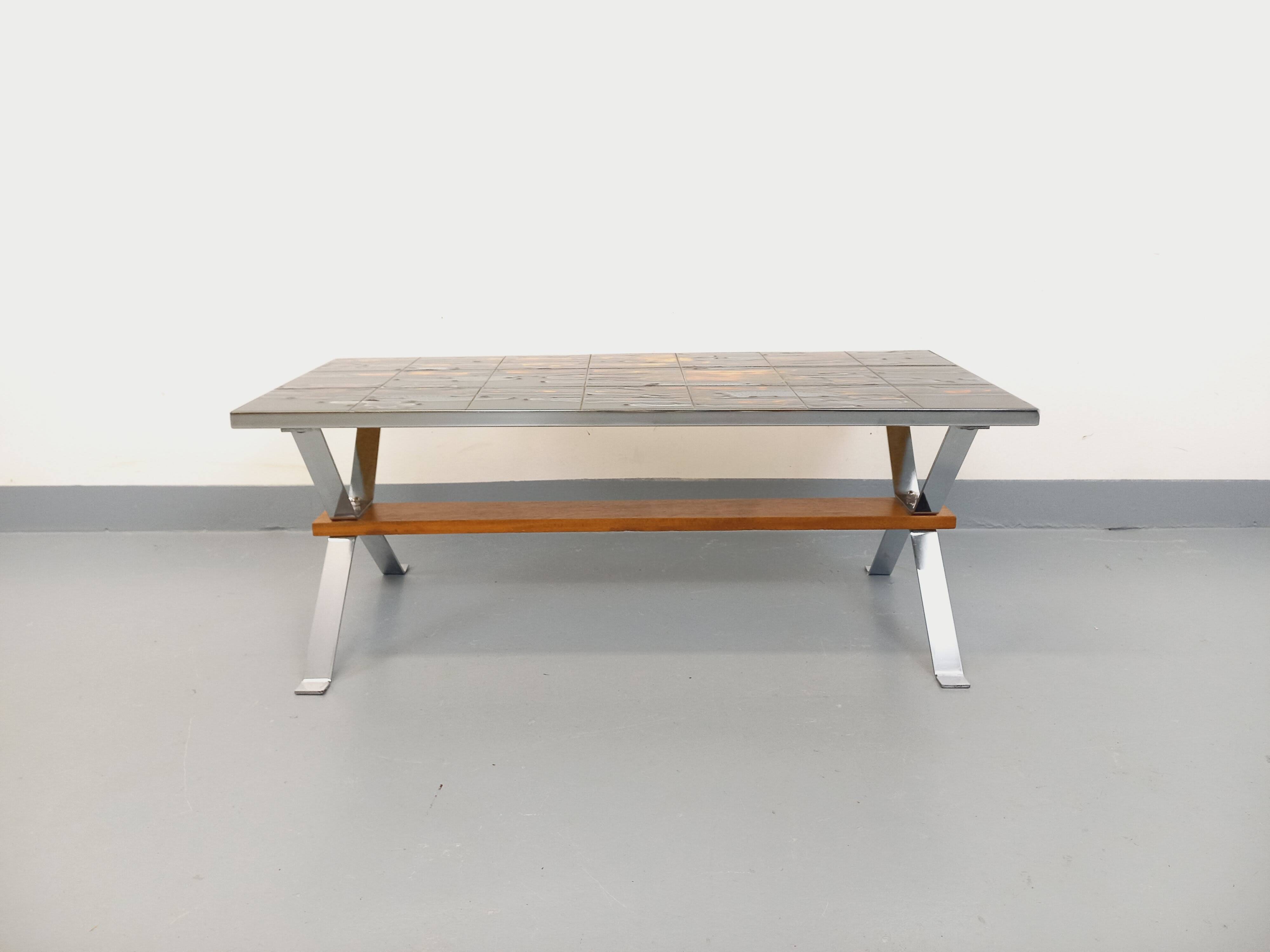 Vintage coffee table from the 60s and 70s in ceramic, chrome metal, and wood.