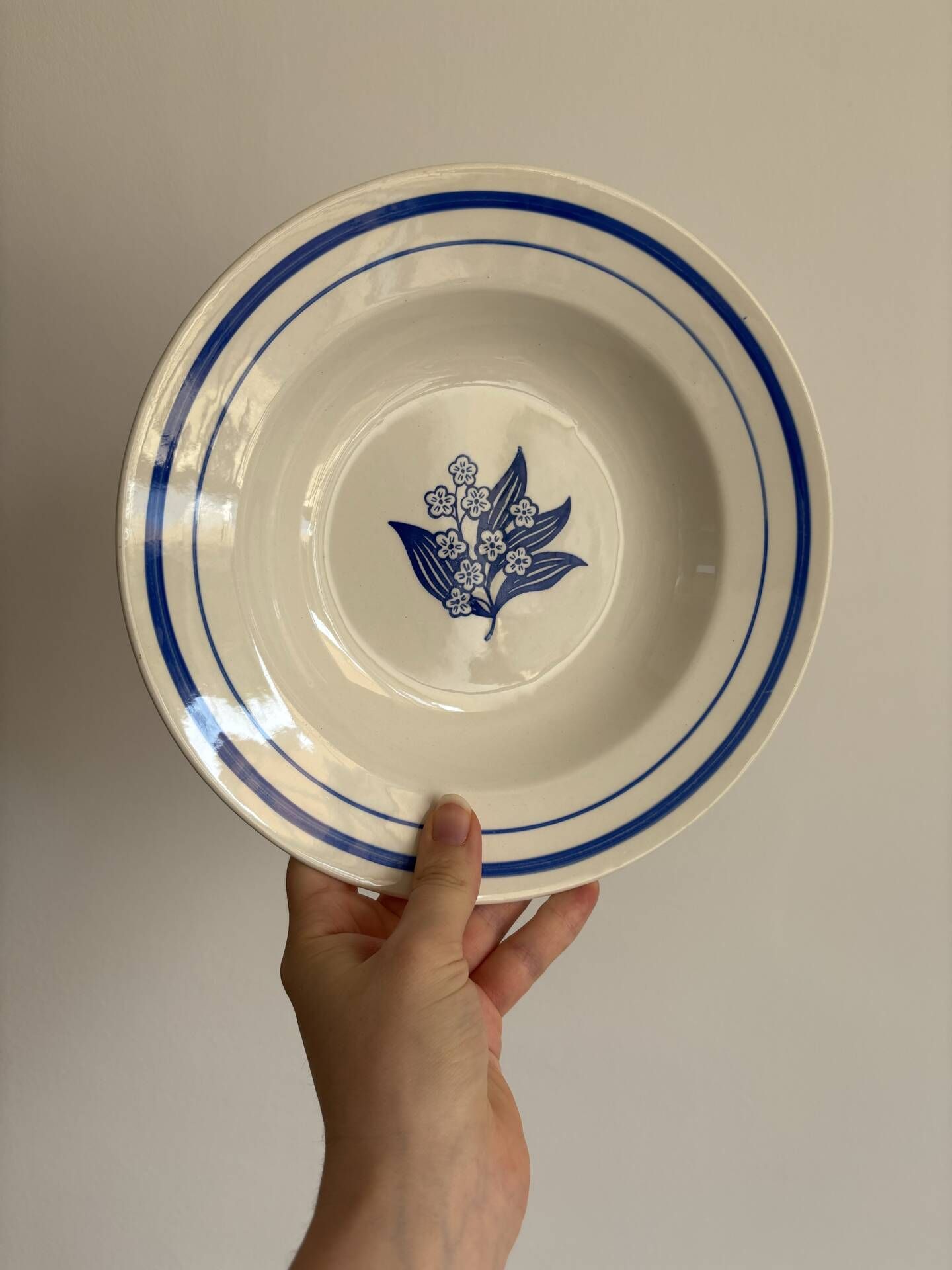 Set of 6 vintage deep plates in earthenware with blue lily of the valley flowers.