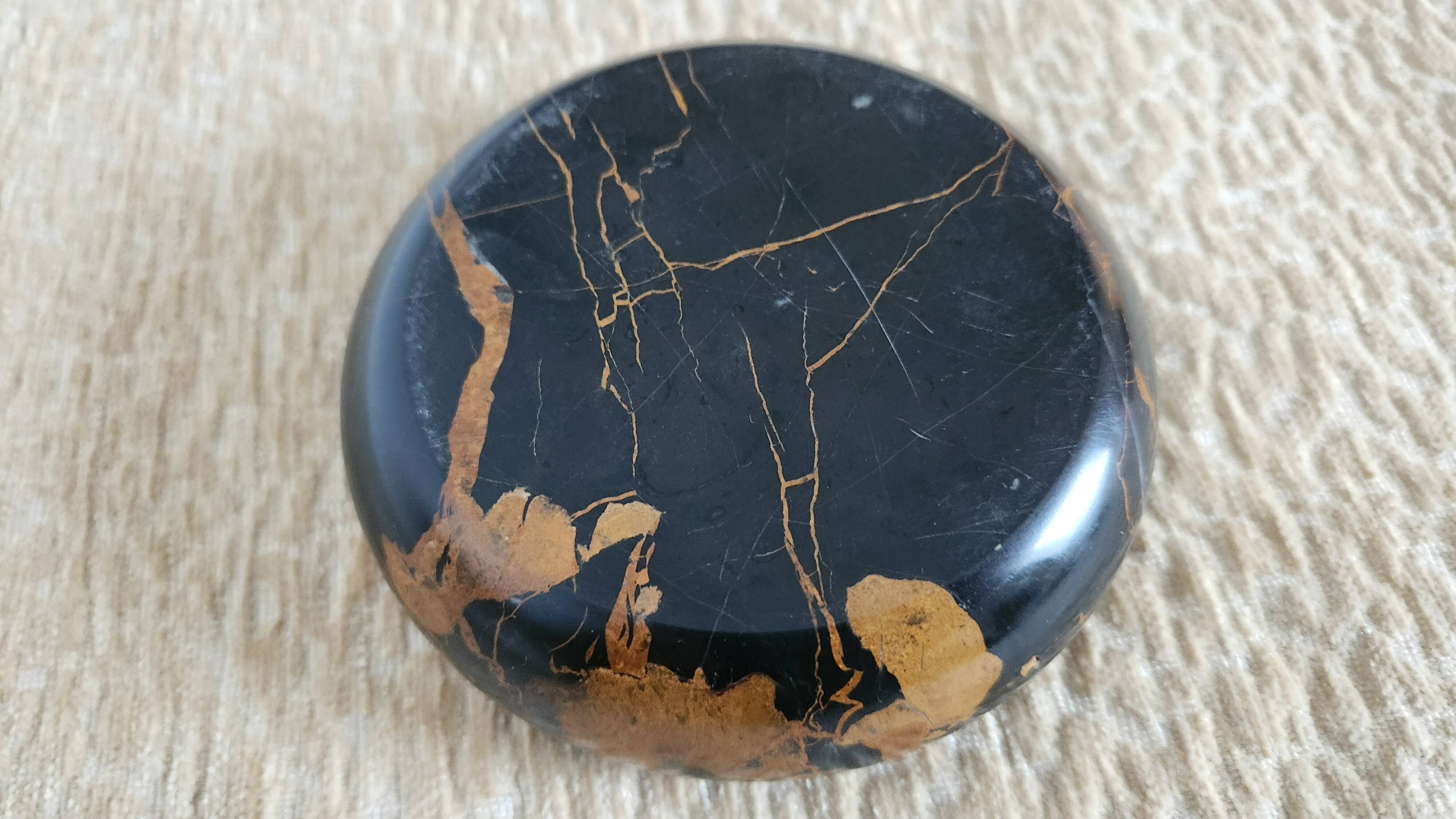 Vintage round ashtray in Italian black and gold Portoro marble.