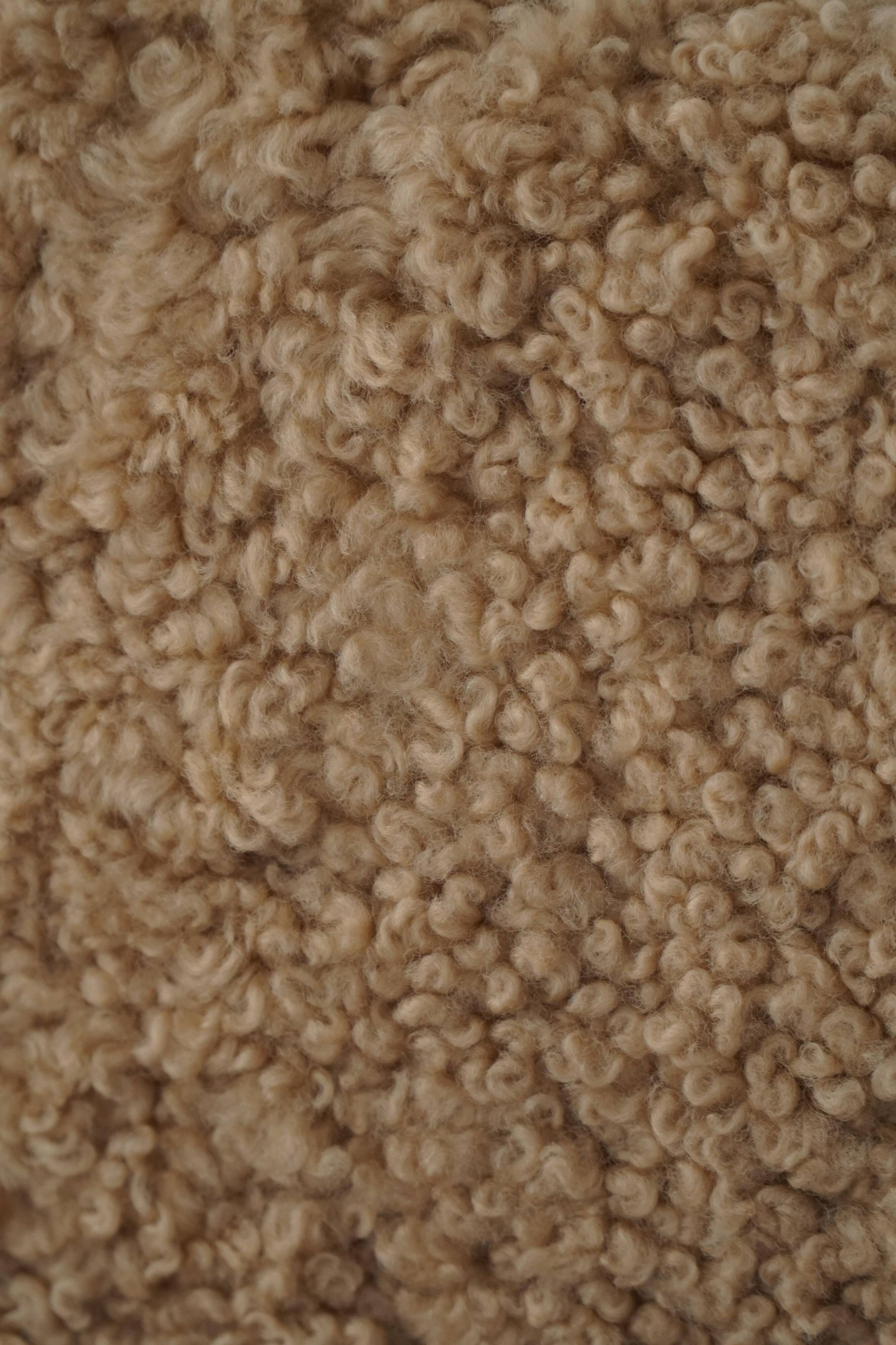 Danish modernist lounge chair in oak and lambswool, Henning Kjærnulf, 1960s