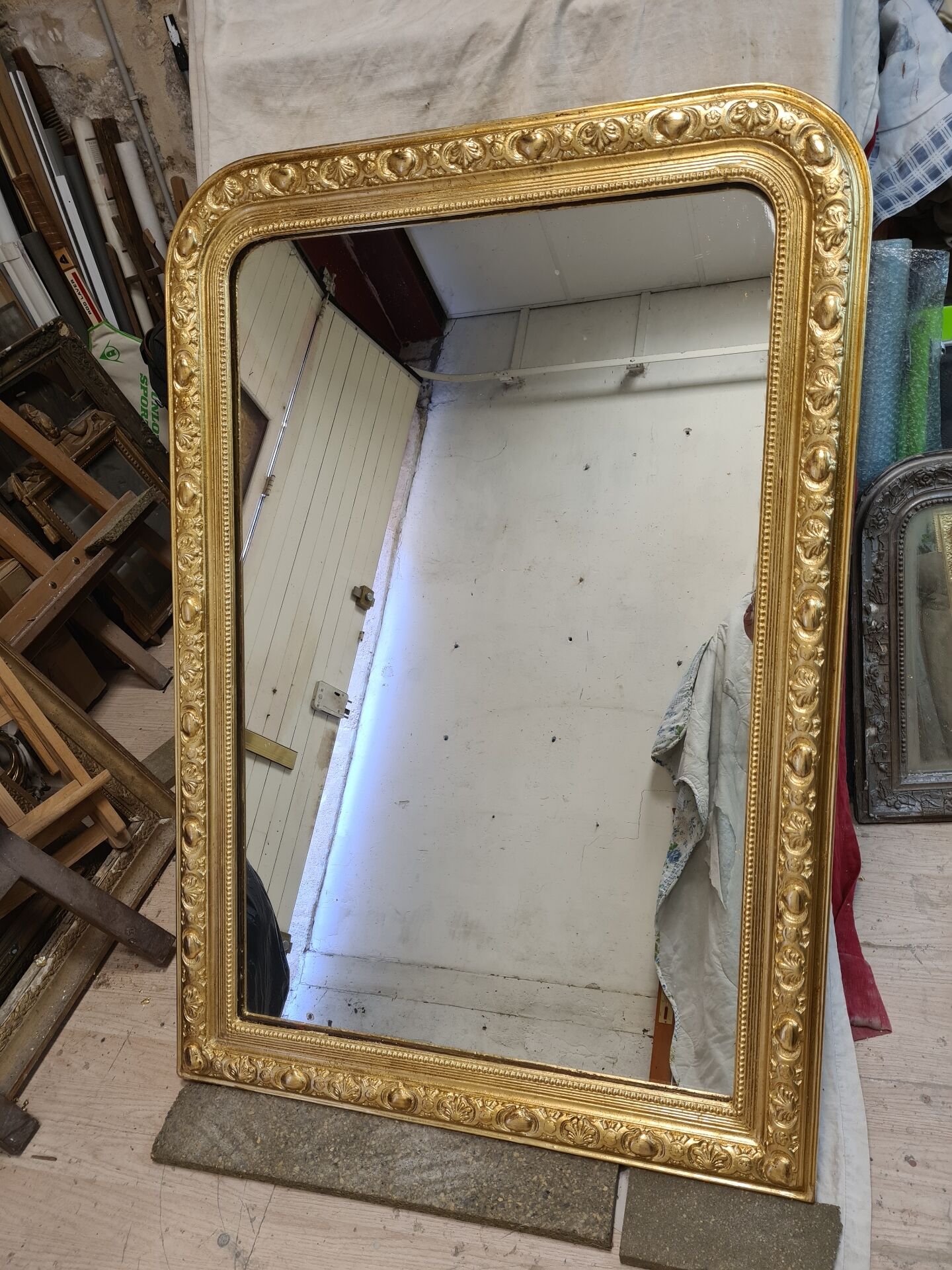 Antique gilded mirror in Louis Philippe style
