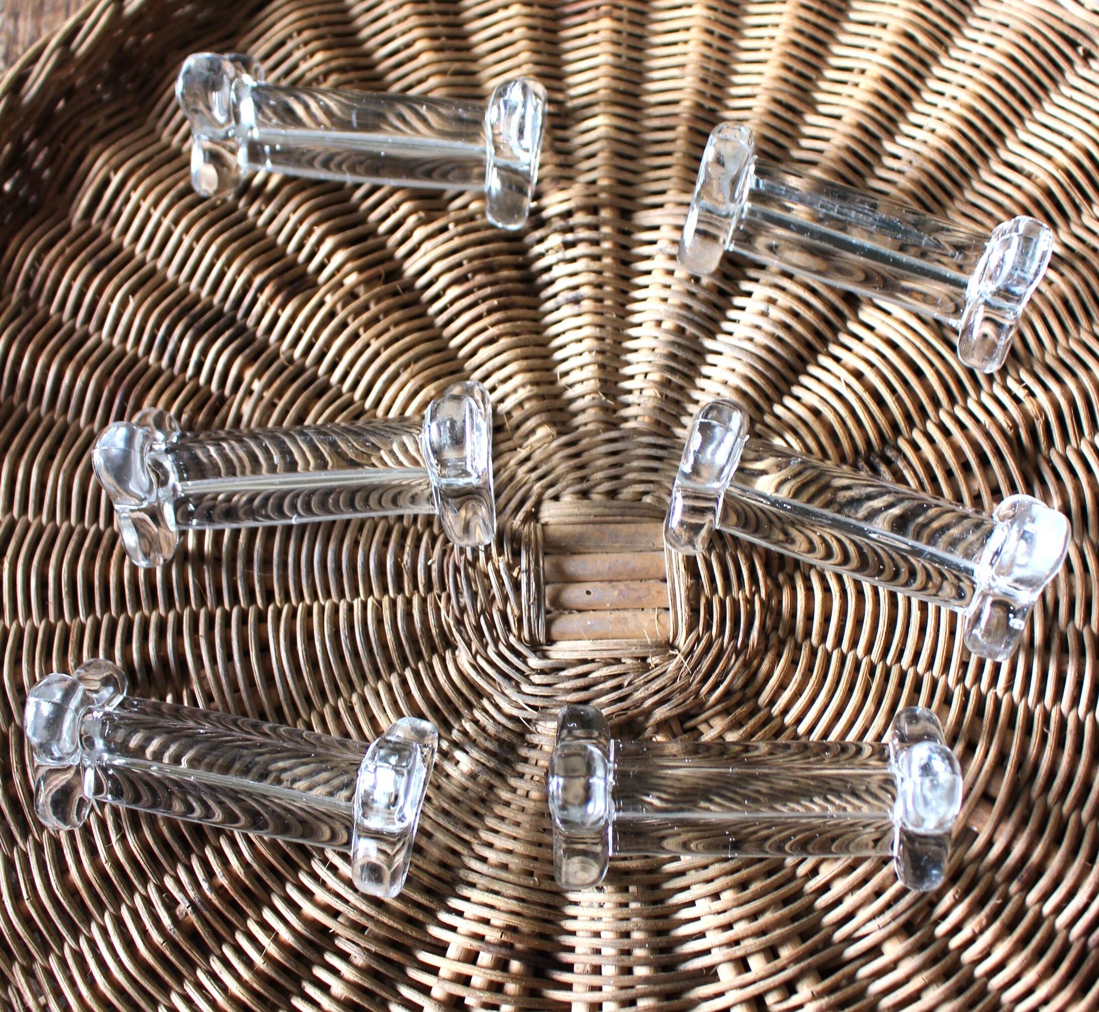 A set of 6 transparent trilobite glass knife rests.