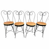 Set of 4 vintage wrought iron chairs from the 1940s.