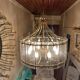 70s designer chandelier with smoked glass plates and gold metal frame