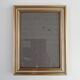 Photo frame under glass, gilded wood