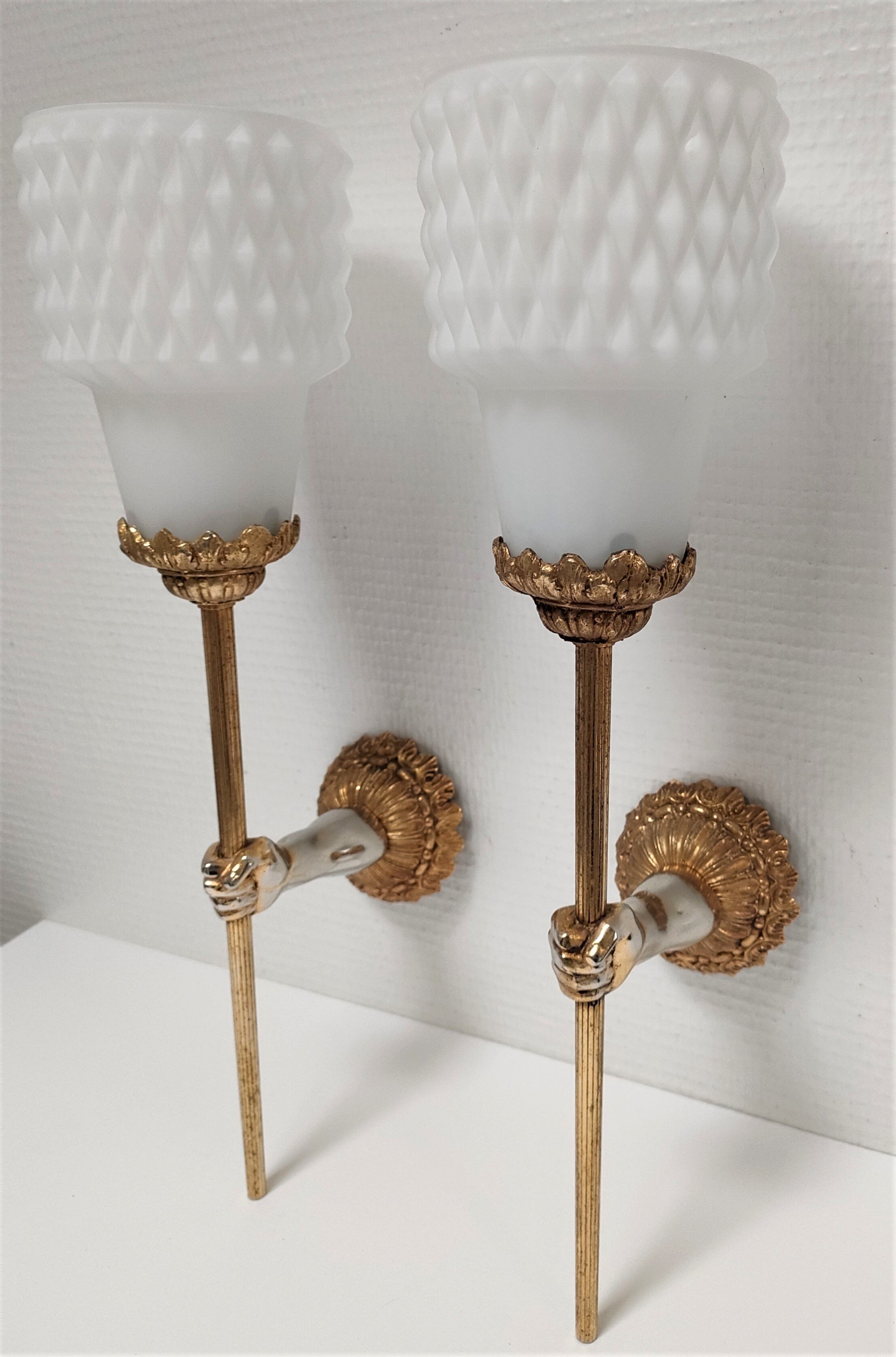 Pair of vintage patinated golden metal hand sconces