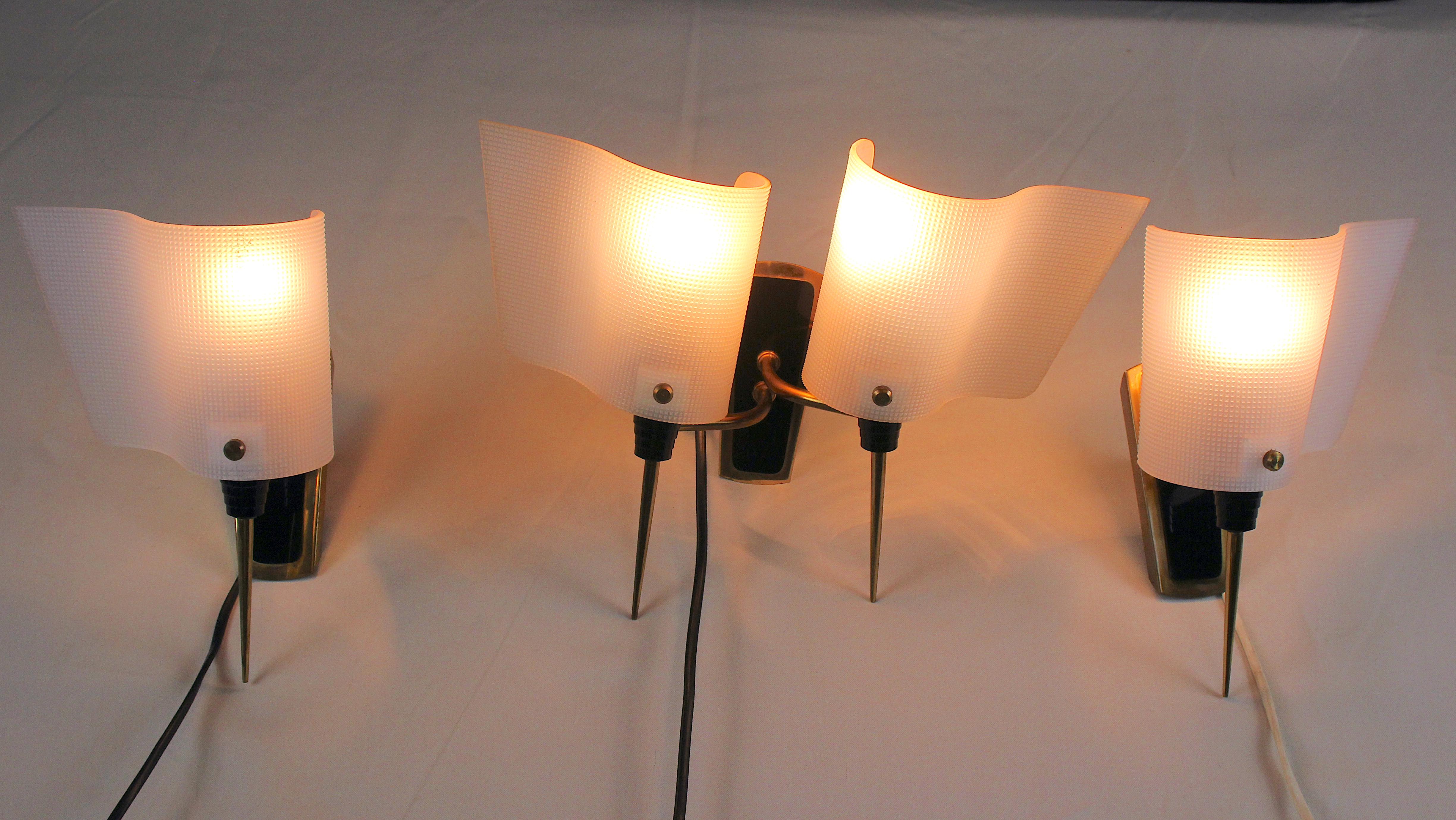 Set of brass, Perspex and metal wall lamps, France Mid-Century
