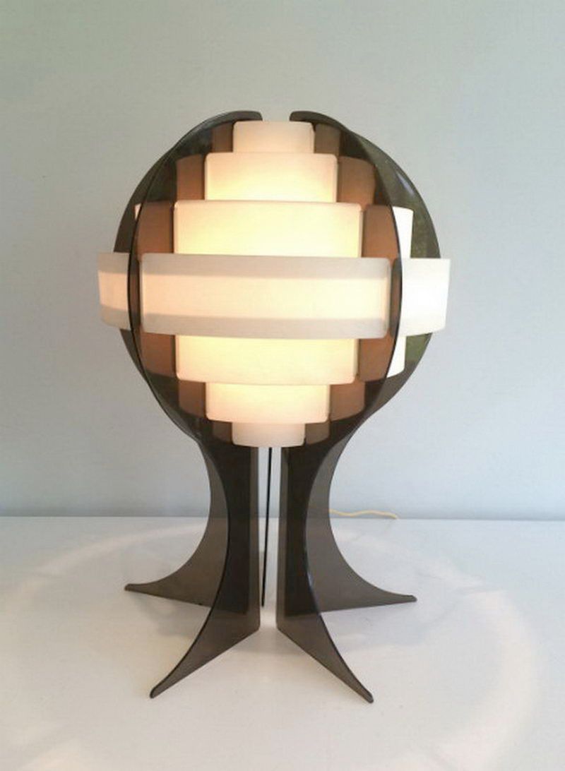 Modernist lamp in plexiglass and white plastic strips.
