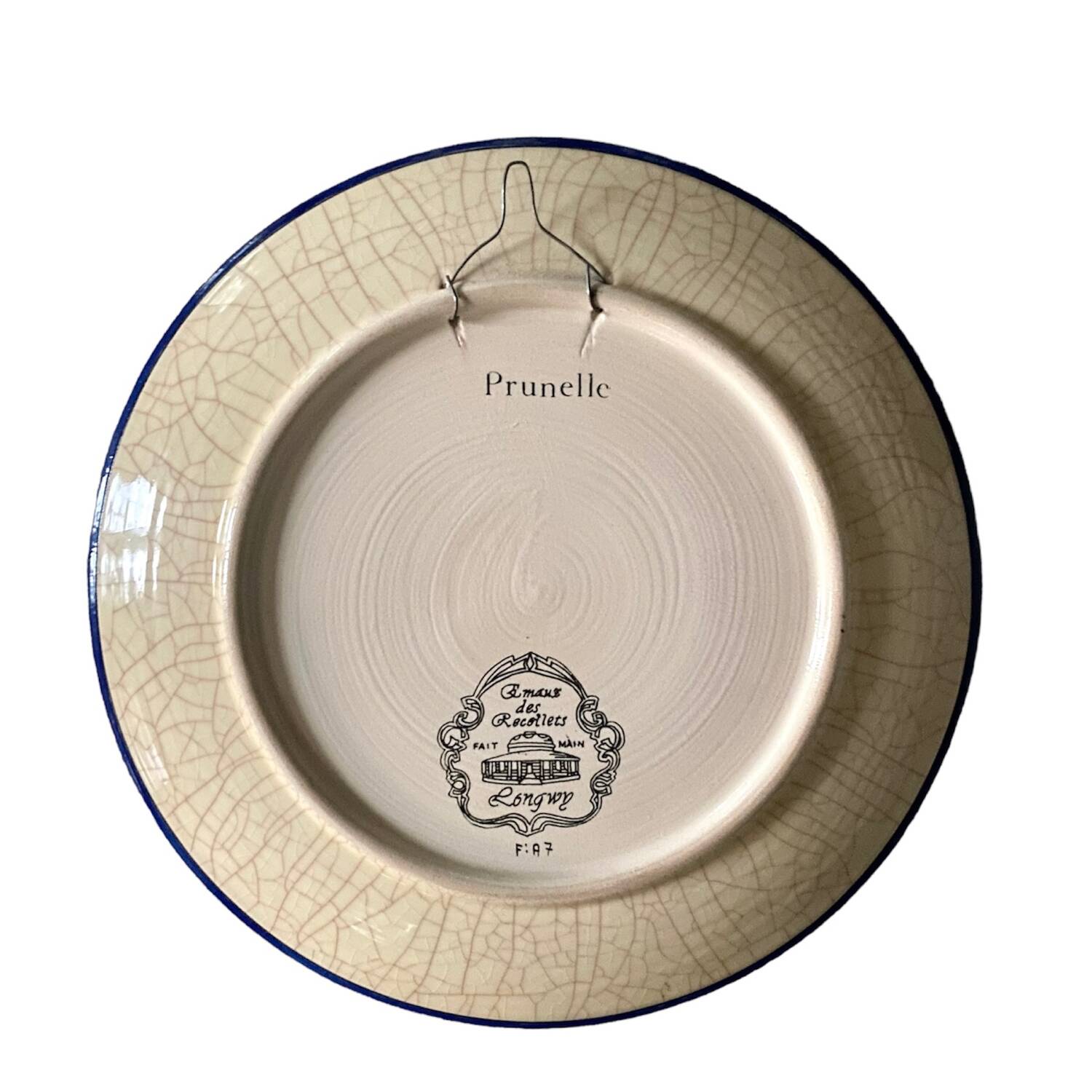 Ceramic plate with Longwy enamels