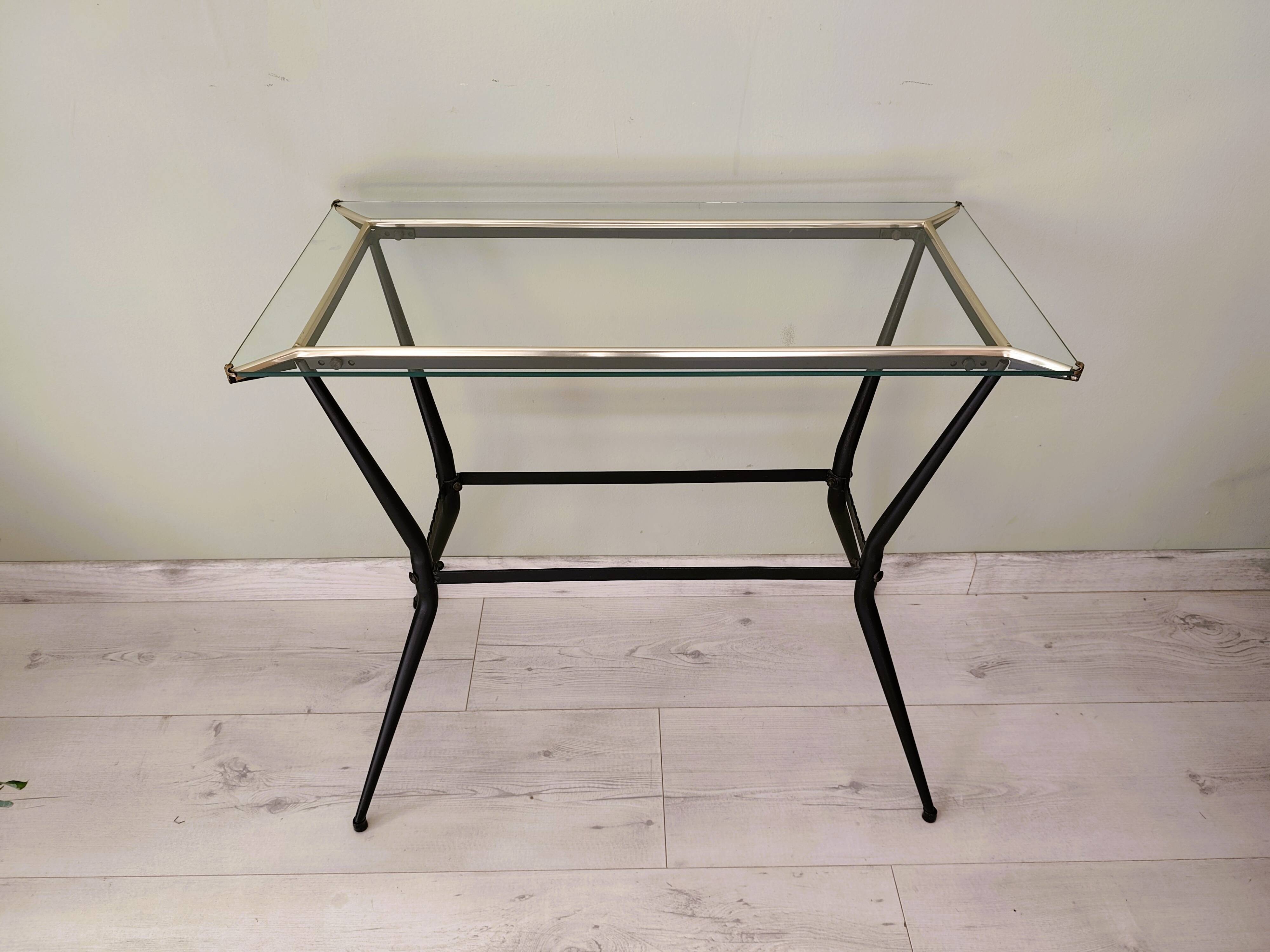 Antique side table made of metal and glass